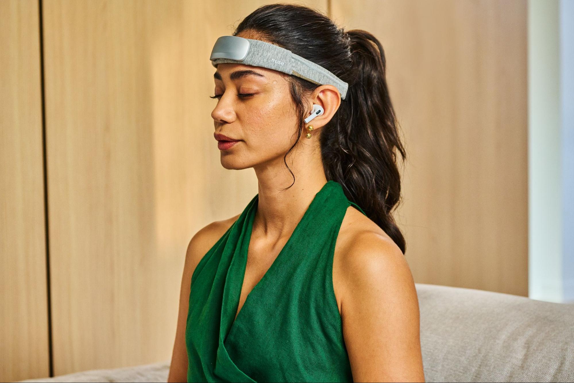 Women wearing Muse S Athena breathing to achieve brain oxygenation
