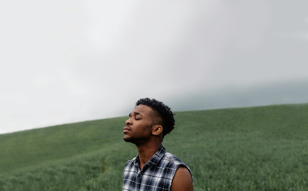 A man thinking and feeling the atmosphere