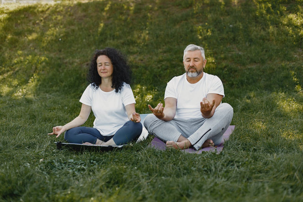 A couple meditation together