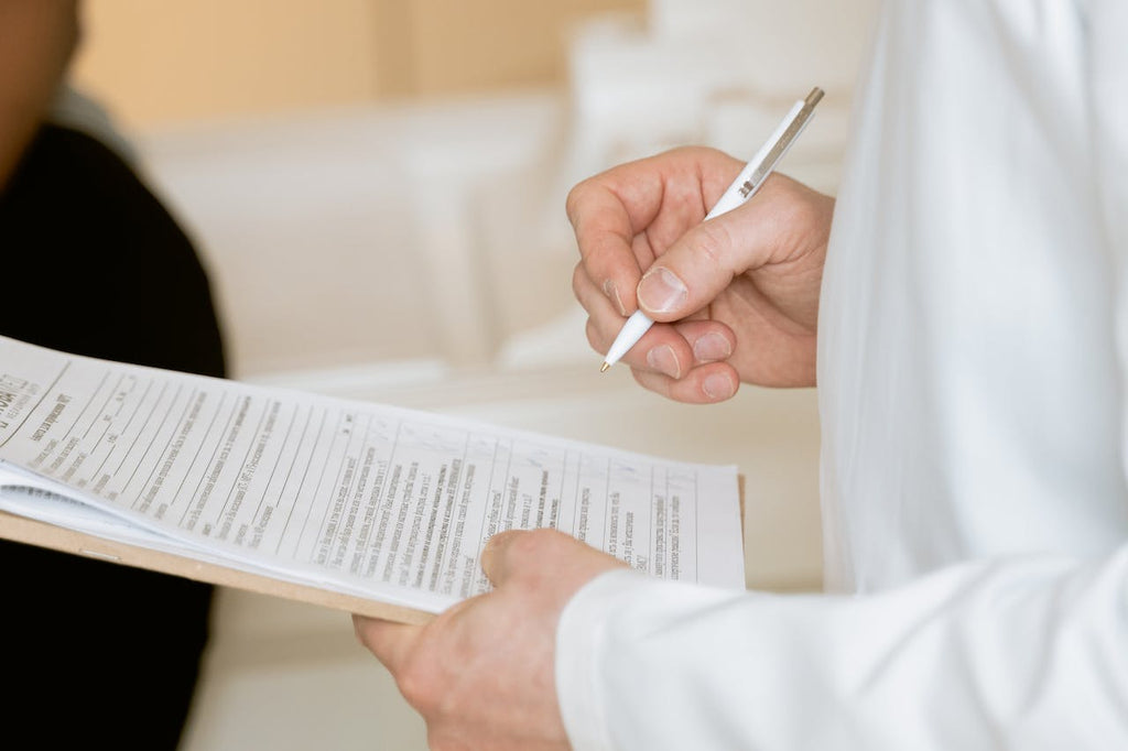 Doctor looking at chart