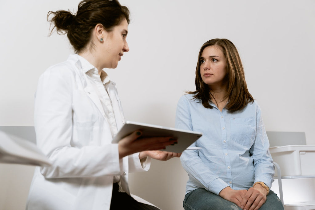 Doctor speaking to patient