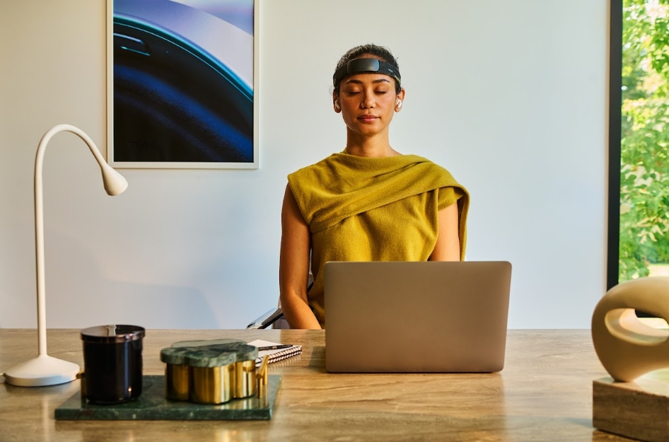 Women using biotracking to train her brain with Muse device